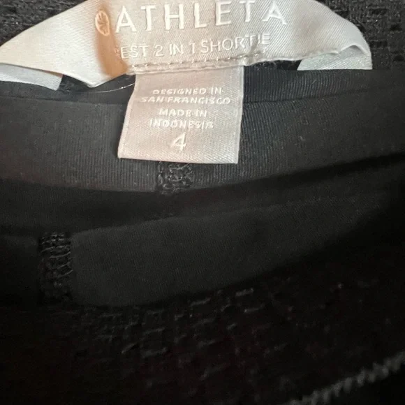 Athleta size 4 woman’s black 2 in 1 athletic shorts with drawstring - Picture 5 of 6
